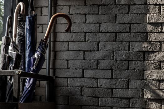 Bangkok, Thailand - 15 Dec 2019 : The sunlight shines on the Umbrella Stand Box in loft style home, Selective focus.
