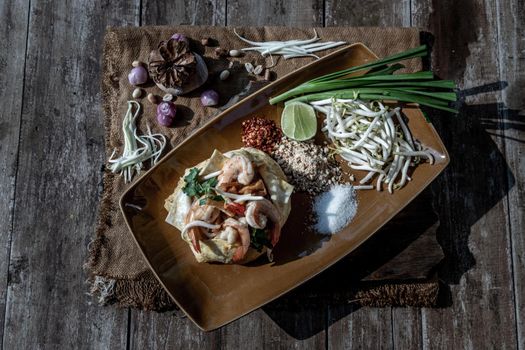 Fried Thai Noodle with Shrimp Wrapped in Egg (Pad Thai), That popular food for foreigner tourists, Top view.