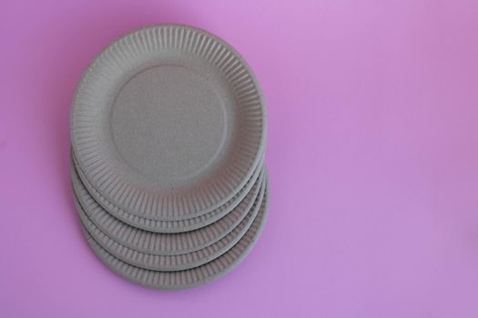 Eco-friendly background on pink background. The concept of a sustainable, environmentally friendly lifestyle.