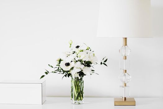 Bouquet of flowers in vase and home decor details, luxury interior design closeup