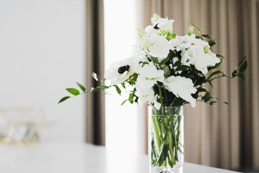 Bouquet of flowers in vase and home decor details, luxury interior design closeup