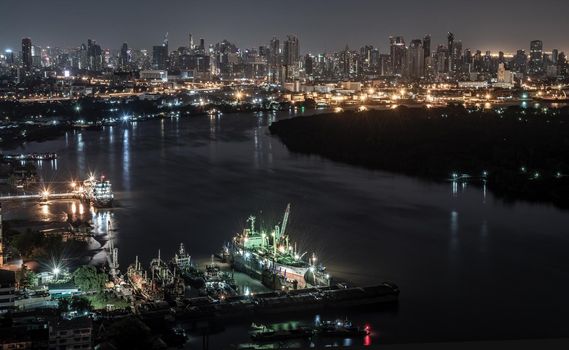 Bangkok, thailand - Oct 18, 2019 : Beautiful view of Bangkok city, Beauty skyscrapers along Chaopraya river in the night, making the city modern style.