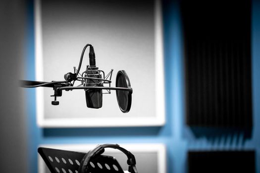 microphone in the studio ready to record voice and music.
