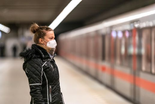 The woman travels by public transport around the city.