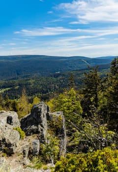 Panorama of Jizera mountains seen from top of big rock