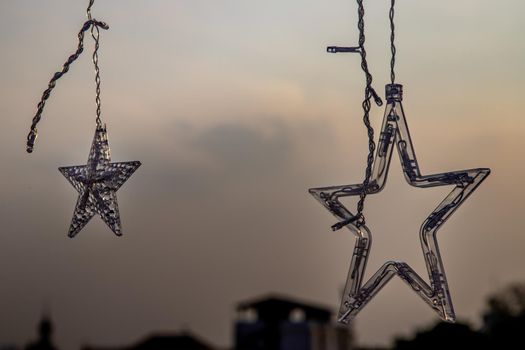 Preparation of lighted decorations on the rooftop for Xmas Holiday and New year festival in bangkok, copy space.