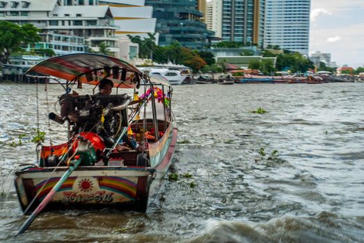 Bangkok, Thailand - 21 Jul 2019 : The passenger ferryboat on the Chao Phraya River.