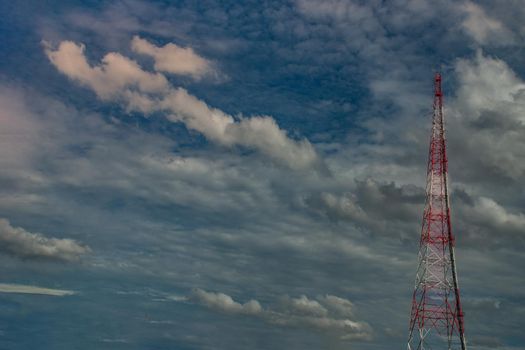Silhouettes Telecommunication tower with there is a backdrop of beautiful sky and clouds. copy space.