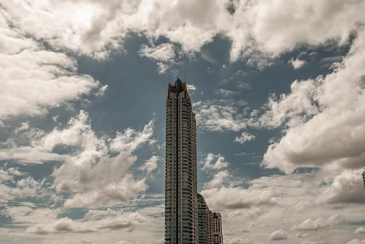 Bangkok, Thailand - 21 Jul 2019 : Afternoon view of Bangkok with skyscrapers in the city There is a backdrop of beautiful sky and clouds.