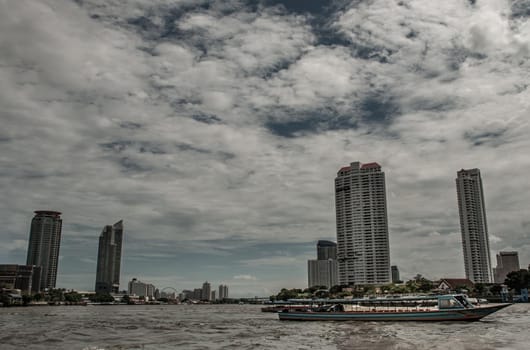 Bangkok, Thailand - 21 Jul 2019: Bangkok skyscrapers along the Chao phraya make it a beautiful city.