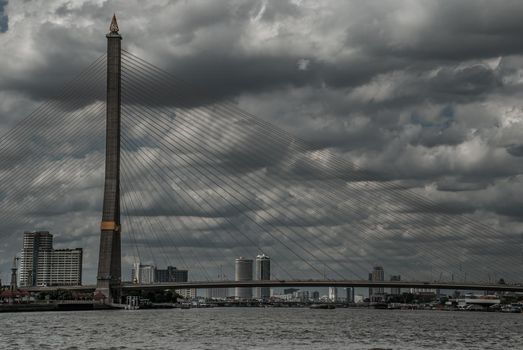 Bangkok, thailand 21 Jul, 2019 : Rama Rama VIII bridge, Rope Bridge across the Chao Phraya River of view blue sky is background and Cityscape of Bangkok.