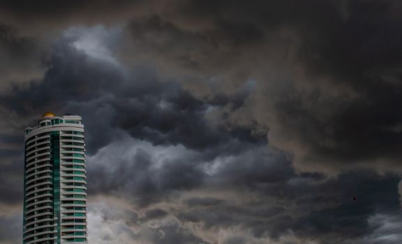 Bangkok, Thailand - 21 Jul 2019 : Beautiful clouds and sky with sun rays over the city, before heavy rain, Landscape of building in the city
