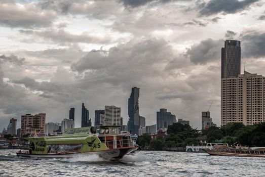 Bangkok, thailand 21 Jul, 2019 : Passengers and travelers traveling by popular transportation Chao Phraya Express boat in Chao Phraya river.