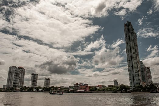 Bangkok, Thailand - 21 Jul 2019: Bangkok skyscrapers along the Chao phraya make it a beautiful city.