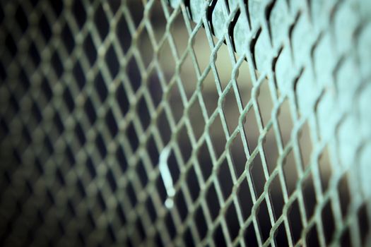 Grating with defocused rhombus shaped background. No people