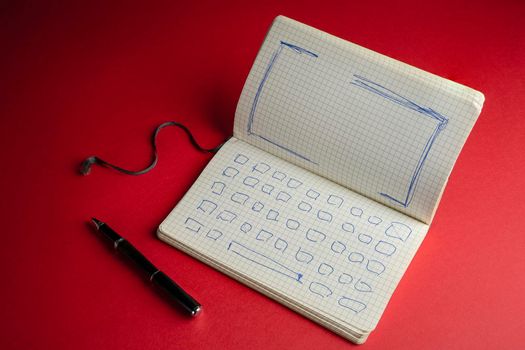 a notebook with the drawing of the keyboard and the screen of a notebook