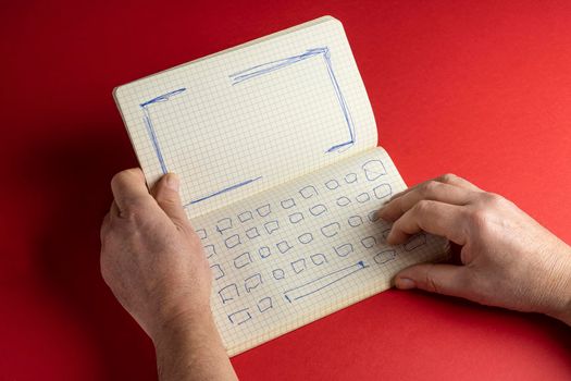 a notebook with the drawing of the keyboard and the screen of a notebook