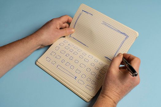 a notebook with the drawing of the keyboard and the screen of a notebook