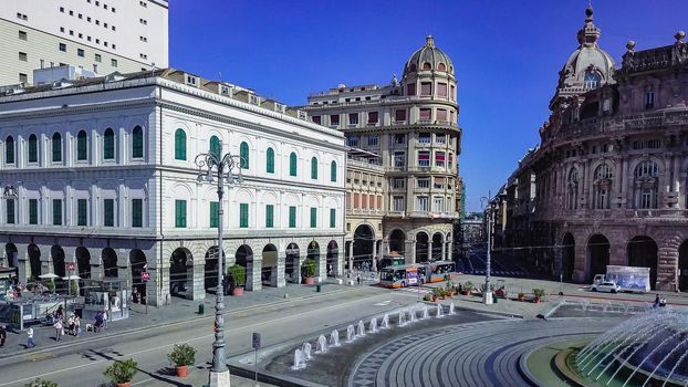 Aerial panoramic drone view of De Ferrari square in Genoa,Italy. Situated in the heart of the city between the historical and the modern center. In the background the Ducal Palace.