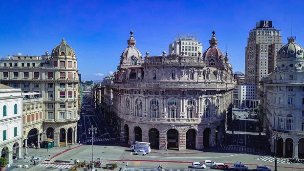 Aerial panoramic drone view of De Ferrari square in Genoa,Italy. Situated in the heart of the city between the historical and the modern center. In the background the Palazzo della Borsa.