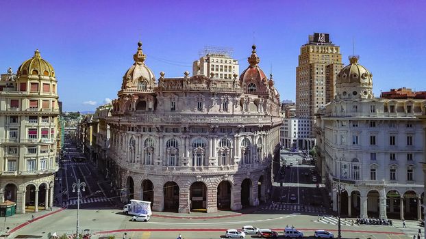 Aerial panoramic drone view of De Ferrari square in Genoa,Italy. Situated in the heart of the city between the historical and the modern center. In the background the Palazzo della Borsa.