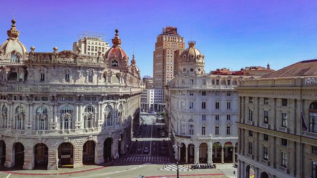 Aerial panoramic drone view of De Ferrari square in Genoa,Italy. Situated in the heart of the city between the historical and the modern center. In the background the Palazzo della Borsa.