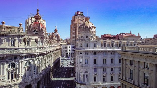 Aerial panoramic drone view of De Ferrari square in Genoa,Italy. Situated in the heart of the city between the historical and the modern center. In the background the Palazzo della Borsa.