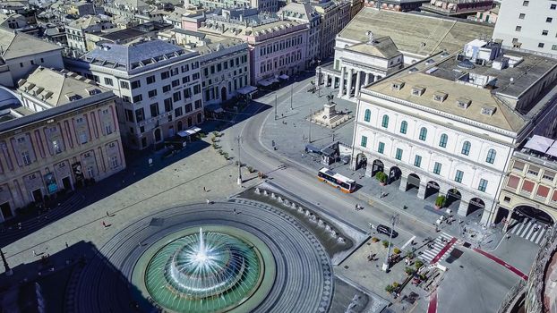 Aerial panoramic drone view of Fountain in the main square of the city Piazza De Ferrari in Genoa,Italy. Situated in the heart of the city between the historical and the modern center.