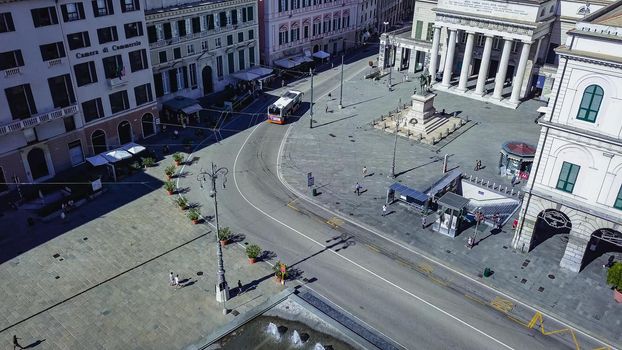 Aerial panoramic drone view of De Ferrari square in Genoa,Italy. Situated in the heart of the city between the historical and the modern center. In the background the Ducal Palace.