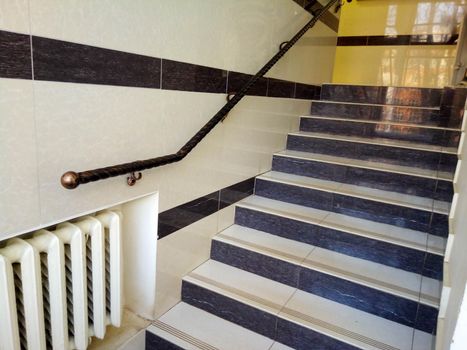 Stairs, railings and steps in a modern building.