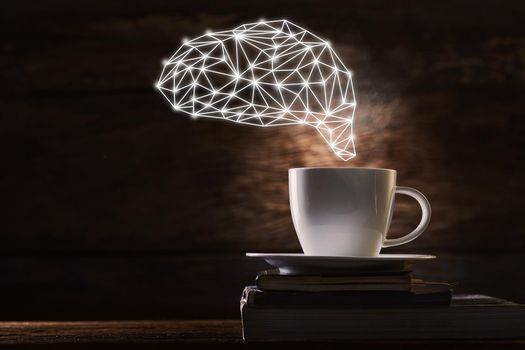 Brain bright with coffee cup on wood background