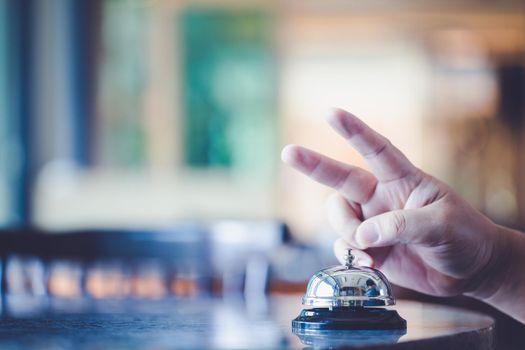 Bell on counter for service with blurred background