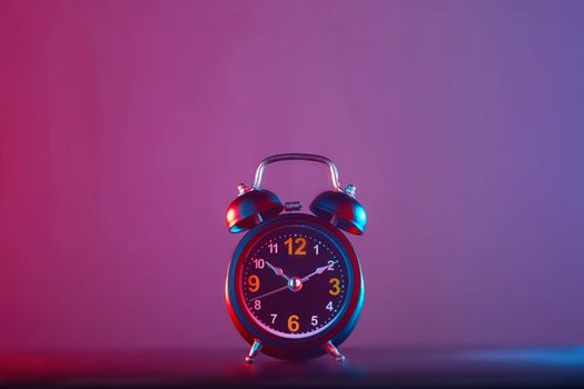 Alarm Clock colorful lighting. Take photo on studio