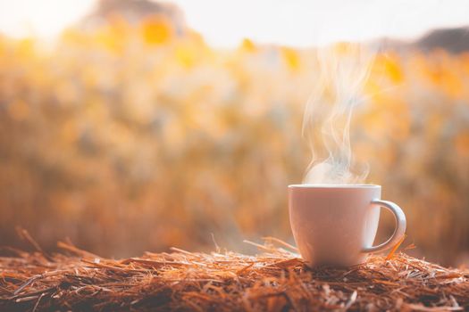 Coffee cup with blurred flower background