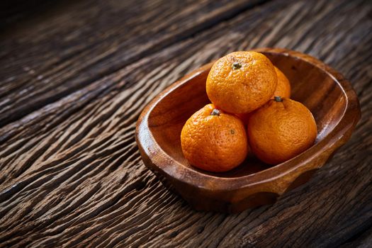 Still life with orange on wood