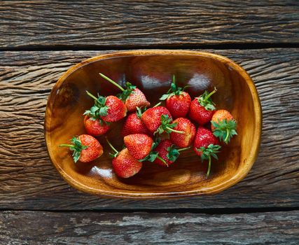 Strawberries on wood. Top view