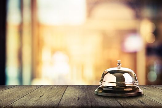 Bell on counter for service with blurred background