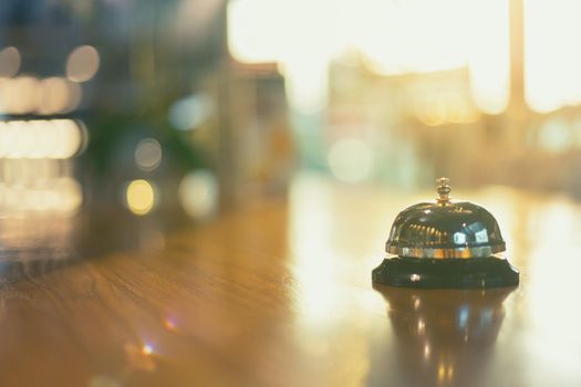 Bell on counter for service with blurred background