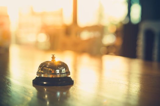 Bell on counter for service with blurred background