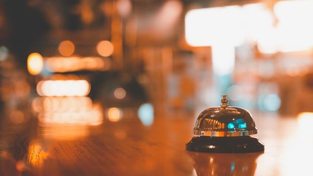 Bell on counter for service with blurred background