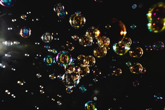 Blur Abstract colorful soap bubbles wallpaper isolated on black background