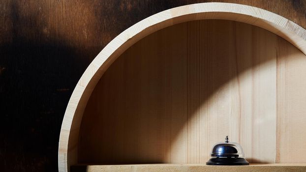 Still life with Bell service on wood. Lighting and shadow