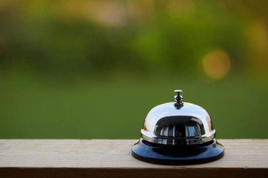 Bell on counter for service with blurred background