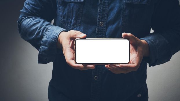 Mobile phone isolated white screen on hand