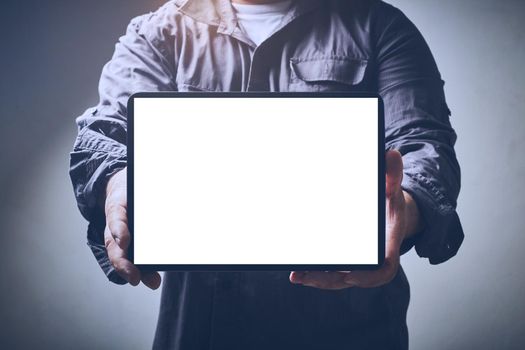 Tablet with screen isolated on white the hands of men