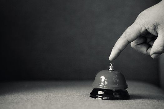 Bell on counter for service with blurred background