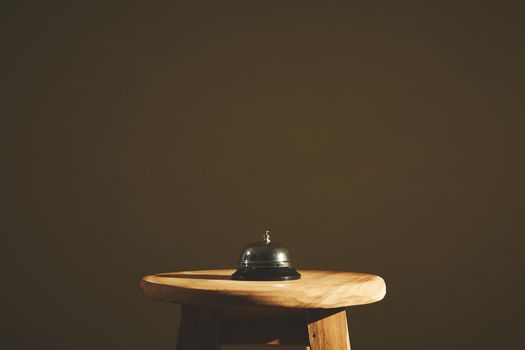 Bell on counter for service with blurred background