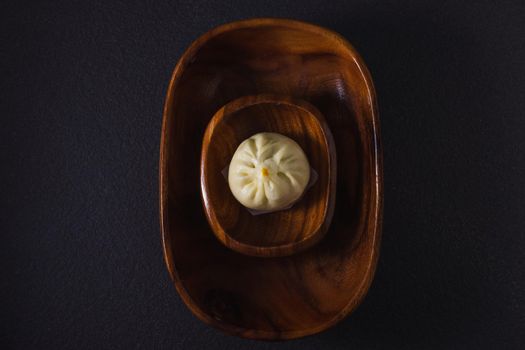 Still life with steamed bun on top view