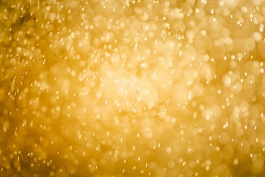 Bokeh abstract background from water splash, Bokeh gold color