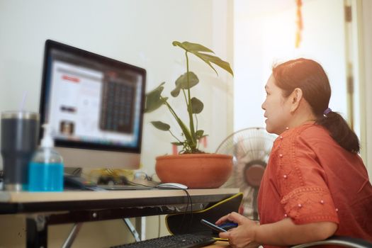 middle aged elderly business woman, Work at home, Shopping on line